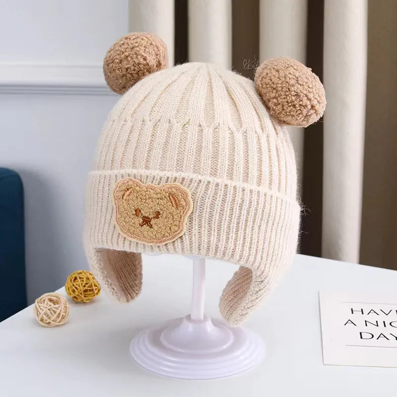 Wool baby hat, with ear protection dear teddy bear